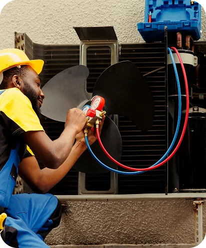 Professional HVAC technician working on air conditioning unit